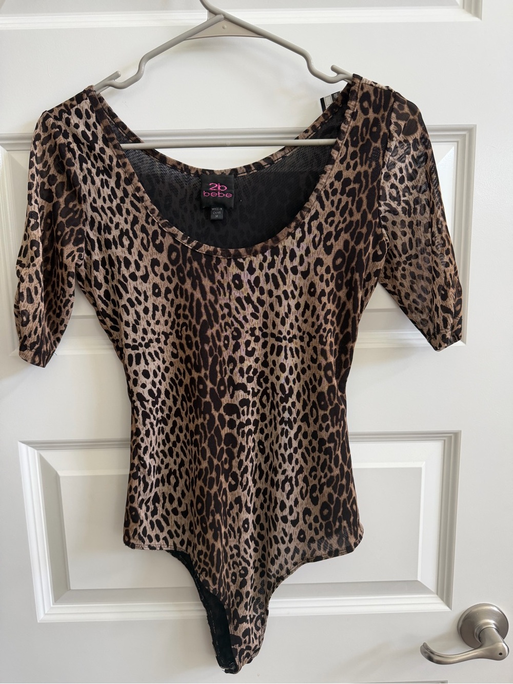 bebe Leopard-Print Scoop Neck Bodysuit in Brown and Black